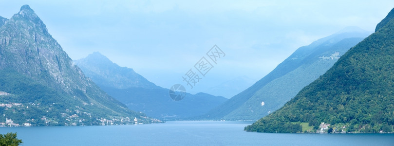 瑞士南部与意大利北边界的卢加诺湖夏季全景图片