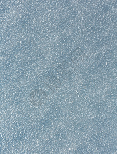 具有晶状雪花自然宏观背景的室外雪表面图片