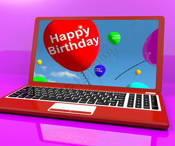 笔记本电脑屏幕上展示在线问候的生日气球笔记本电脑屏幕上展示的生日气球快乐图片