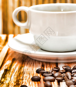 代表美味咖啡因和食堂的新鲜咖啡杯图片