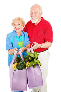 有环保意识的老年夫妇使用可再的杂货袋图片