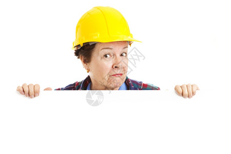 女建筑工人在偷窥一个空白的标志设计元素图片