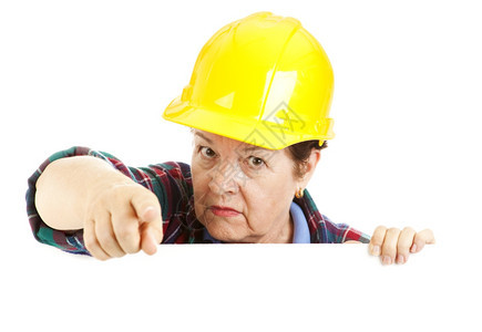 女建筑工人靠在空间上指着向并用警告的眼光看着她脸孤立设计元素背景图片