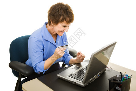女商人在工作时网上购物孤立的白种人图片