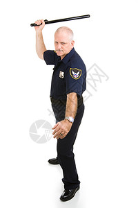 警官有攻击姿势用他的夜棍全身都是白的图片
