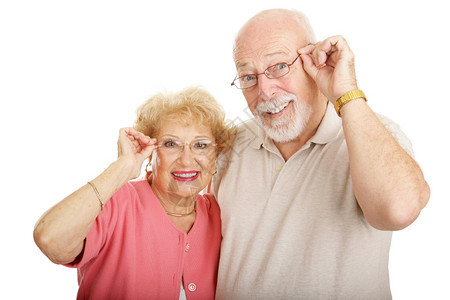 有吸引力的老年夫妇戴眼镜孤立在白色上图片