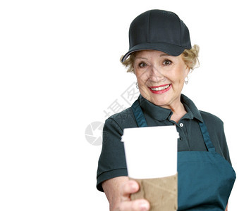 一位美丽的高贵女士带着笑容为咖啡服务图片