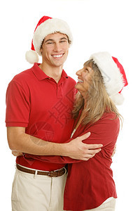 大学时代的年轻人和他妈在圣诞节一起笑孤立的白人图片