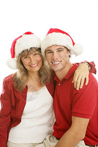 漂亮的中年妈和英俊的大学儿子一起过圣诞节白种背景图片