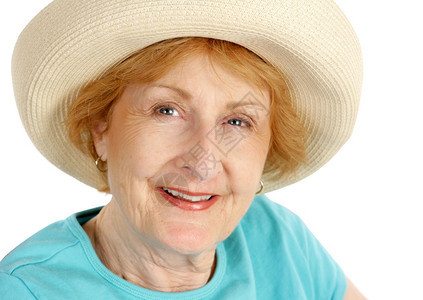 一位穿着暑期帽子的美女特写肖像白色背景图片