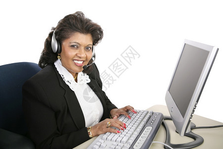 电脑上一位友好的印度妇女提供技术支援孤立的白种人图片