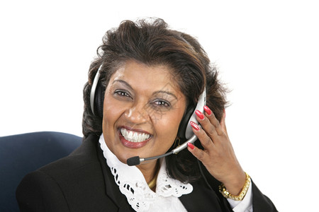一个友好的印度客户服务代理戴着耳机白被孤立图片
