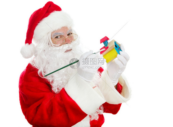 圣诞老人在节画一个小孩的玩具图片