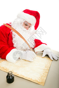 圣诞老人在纸上写圣诞名单用笔和墨水写字图片
