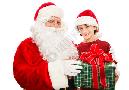 圣诞老人送礼物给一个可爱的小男孩孤立白人男孩图片