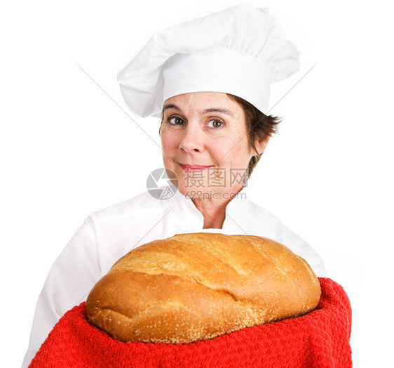 漂亮的女面包师傅拿着一串新鲜烤面包金棕色和褐白底的孤立无援图片