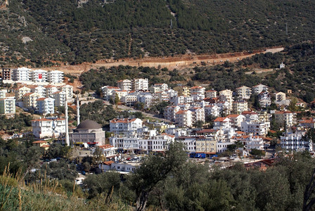 土耳其卡什山和民宅背景图片