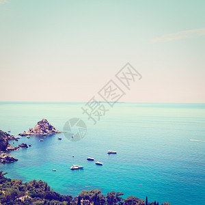 意大利海景与山丘和缩海岸线日落回溯效应图片