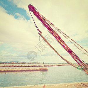 向葡萄牙大西洋海岸一个港的水域发射船只鲁斯提机制VintageStyleToldPicture图片