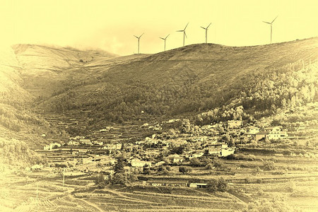 现代风涡轮发电能源在葡萄牙园上空生产StylizedPhoto图片