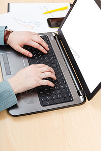 业务工作流程与办公桌切割屏幕的膝上型计算机合作图片