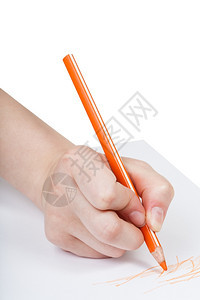 在白色背景上隔绝的纸用橙色铅笔画手图片