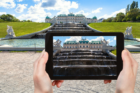 旅行概念维也纳贝尔韦德雷宫花园顶喷泉级联平板的旅游景图片