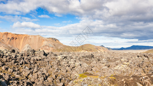 冰岛之旅9月冰岛高原地区Fjallabak自然保护区Laugar地区陆上Laugahraun火山熔岩场全景图图片