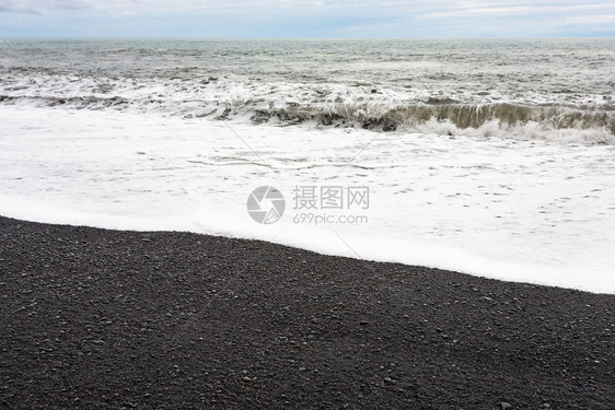 前往冰岛雷尼斯法哈拉海滩上浪位于塞普坦贝尔KatlaGearpark的大西洋南海岸VikIMyrdal村附近图片