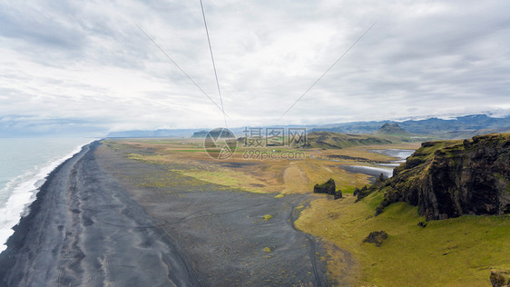 去冰岛旅游九月在卡特拉地质公园的大西洋南岸VikIMyrdal村附近的Dyrholaey海角观看索尔黑马法拉海滨图片