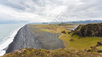去冰岛旅游九月在卡特拉地质公园的大西洋南岸VikIMyrdal村附近的Dyrholaey海角观看Solheimafjara海岸线图片