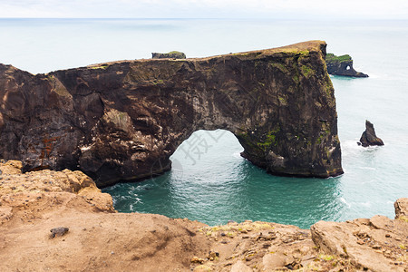 前往冰岛Dyrholaey半岛的熔岩拱门位于塞普坦贝尔KatlaGearpark的大西洋南海岸VikIMyrdal村附近的Vyr图片