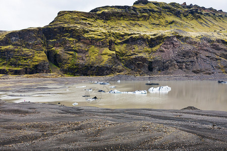 前往冰岛从Solheimajajokol冰川Myrdalsjokull冰盖南川舌头到岛大西洋南岸KatlaGeopark的冰融化图片