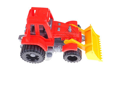 白色背景的红玩具拖拉机图片