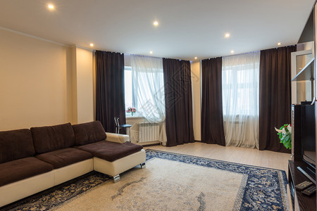 房间宽敞一个宽敞的现代大厅内部背景