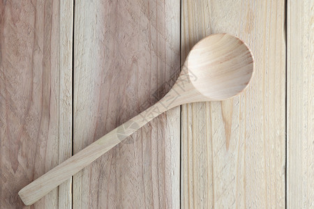 木地板上的勺子用于设计食物概念背景背景图片