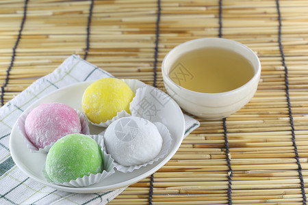 日本甜点和热茶作为食物背景背景图片