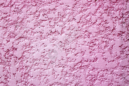 粉红色的水泥墙有房子的背景图片