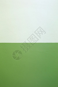 水泥墙为背景漆绿色和奶油颜图片