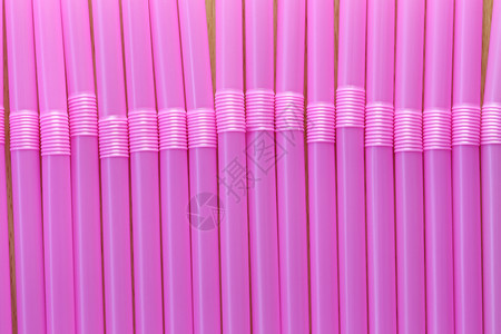 粉色的饮料管抽象背景设计想法图片