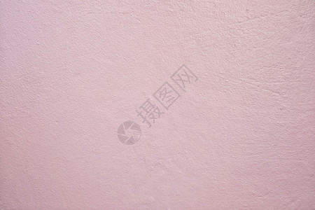 在你的工作背景概念中设计浅粉色脏水泥墙的背景图片