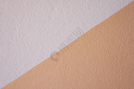 在你的工作背景概念中设计墙的橙色混凝土纹理图片