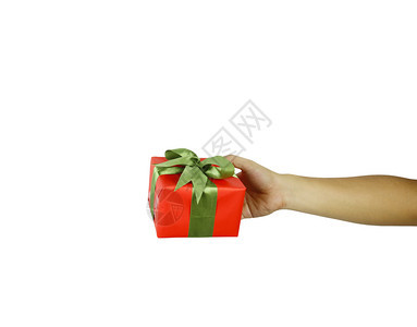 手持红色礼物盒的人孤立在白色背景并有剪切路径图片