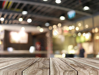 空木桌和餐厅背景模糊具有设计概念的复制空间图片