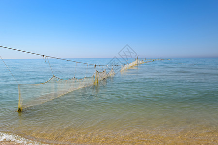 放在海里的渔网渔网放在海里的渔网渔网图片