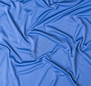 皱纹的蓝色faux织物运动服帆布整身图片