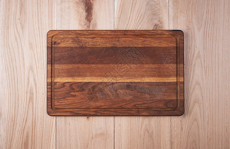 顶视图木制表格上的空旧厨房剪切板图片