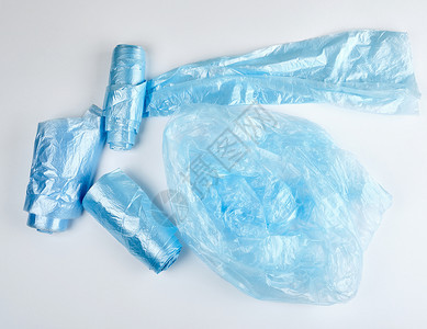 顶视图白色背景的垃圾用蓝色塑料袋图片