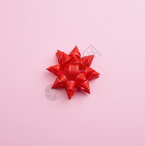 粉红背景的大美丽弓设计师节庆元素复制空间图片