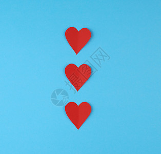 蓝色背景的红纸心情人节的庆背景复制空间图片